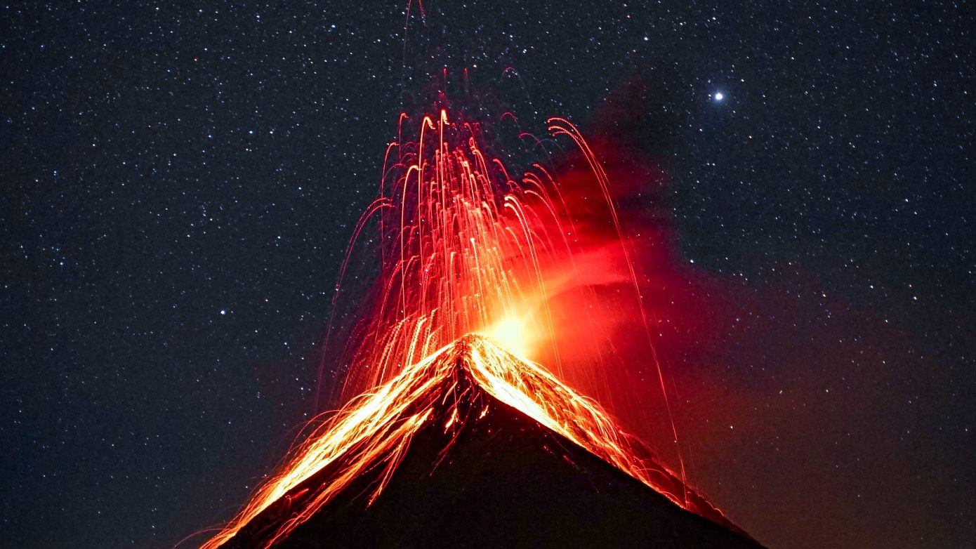 Volcano reupting at night